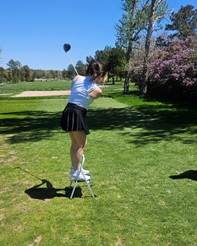 A person swinging a golf club

AI-generated content may be incorrect.