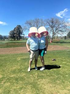 Two people wearing buckets on their heads

AI-generated content may be incorrect.